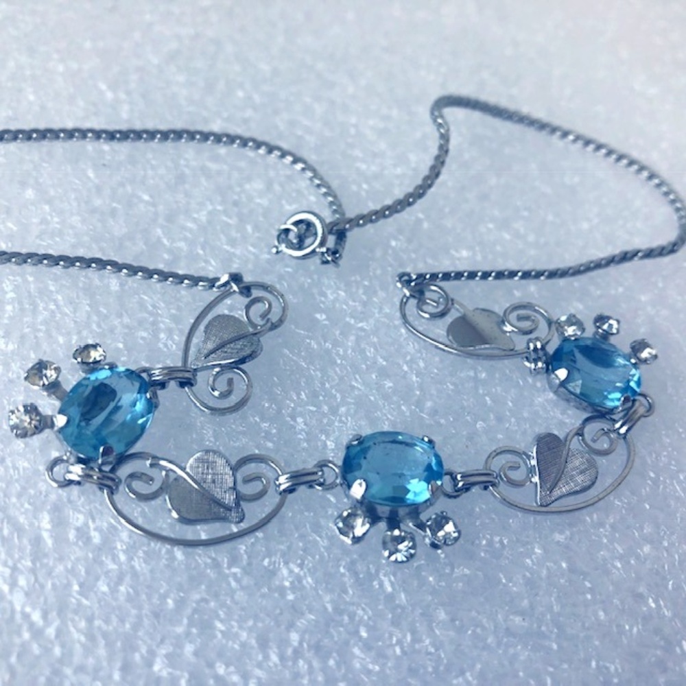 Sterling silver Van dell necklace blue gemstone?